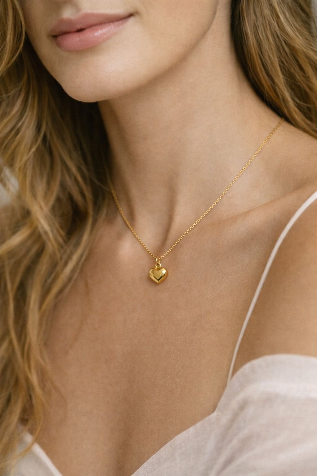 Pendentif cœur bombé d’or 18k, 1.26g image 1