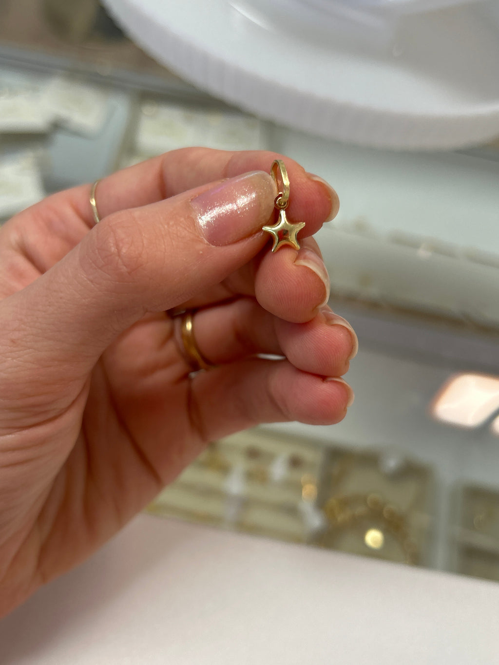 18k gold small star pendant, 0.44g